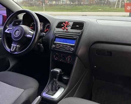 Красный Фольксваген Поло, объемом двигателя 1.39 л и пробегом 158 тыс. км за 6900 $, фото 12 на Automoto.ua