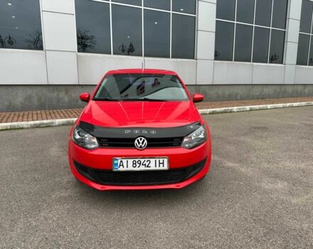 Красный Фольксваген Поло, объемом двигателя 1.4 л и пробегом 158 тыс. км за 6950 $, фото 1 на Automoto.ua