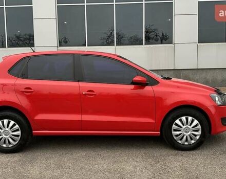 Красный Фольксваген Поло, объемом двигателя 1.39 л и пробегом 158 тыс. км за 6950 $, фото 4 на Automoto.ua