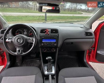 Красный Фольксваген Поло, объемом двигателя 1.39 л и пробегом 158 тыс. км за 6900 $, фото 7 на Automoto.ua