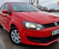 Красный Фольксваген Поло, объемом двигателя 1.39 л и пробегом 133 тыс. км за 7500 $, фото 1 на Automoto.ua