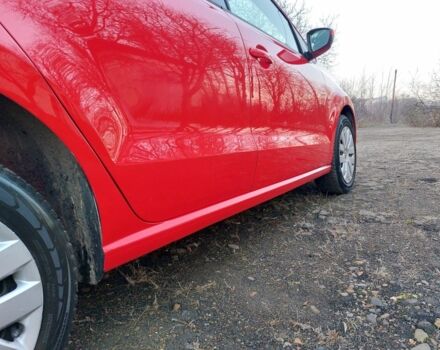 Червоний Фольксваген Поло, об'ємом двигуна 1.2 л та пробігом 200 тис. км за 5550 $, фото 11 на Automoto.ua