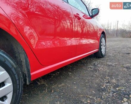 Червоний Фольксваген Поло, об'ємом двигуна 1.2 л та пробігом 200 тис. км за 5550 $, фото 21 на Automoto.ua