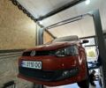 Красный Фольксваген Поло, объемом двигателя 1.4 л и пробегом 142 тыс. км за 10000 $, фото 1 на Automoto.ua