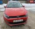 Красный Фольксваген Поло, объемом двигателя 1.4 л и пробегом 170 тыс. км за 9000 $, фото 1 на Automoto.ua