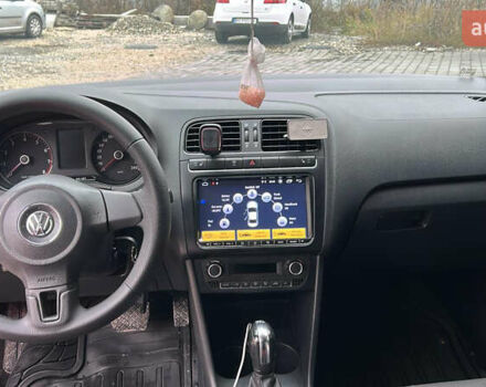 Червоний Фольксваген Поло, об'ємом двигуна 1.39 л та пробігом 180 тис. км за 7850 $, фото 8 на Automoto.ua