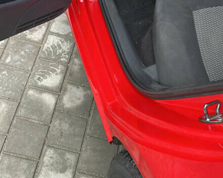 Червоний Фольксваген Поло, об'ємом двигуна 1.39 л та пробігом 180 тис. км за 7850 $, фото 17 на Automoto.ua