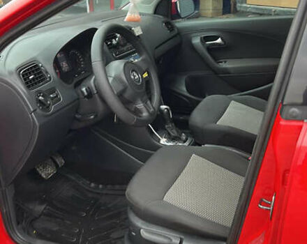 Червоний Фольксваген Поло, об'ємом двигуна 1.39 л та пробігом 180 тис. км за 7850 $, фото 6 на Automoto.ua