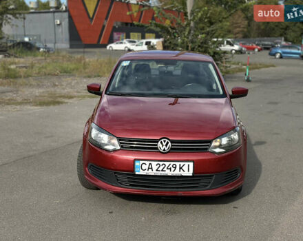 Красный Фольксваген Поло, объемом двигателя 1.6 л и пробегом 229 тыс. км за 5150 $, фото 1 на Automoto.ua