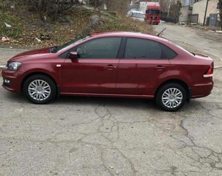 Красный Фольксваген Поло, объемом двигателя 1.4 л и пробегом 111 тыс. км за 9500 $, фото 1 на Automoto.ua