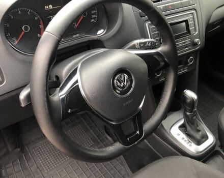 Красный Фольксваген Поло, объемом двигателя 1.4 л и пробегом 111 тыс. км за 9500 $, фото 6 на Automoto.ua