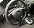 Красный Фольксваген Поло, объемом двигателя 1.4 л и пробегом 111 тыс. км за 9500 $, фото 6 на Automoto.ua