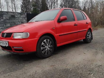 Красный Фольксваген Поло, объемом двигателя 1 л и пробегом 286 тыс. км за 1900 $, фото 1 на Automoto.ua