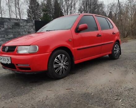 Красный Фольксваген Поло, объемом двигателя 1 л и пробегом 286 тыс. км за 1900 $, фото 1 на Automoto.ua