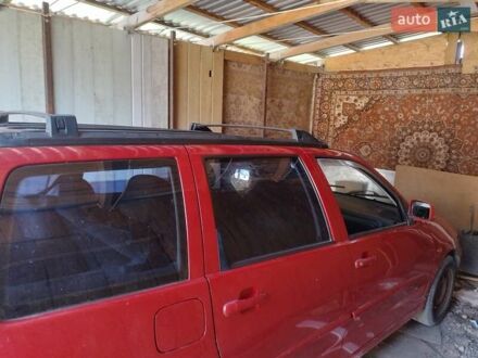 Красный Фольксваген Поло, объемом двигателя 1.39 л и пробегом 185 тыс. км за 2000 $, фото 1 на Automoto.ua