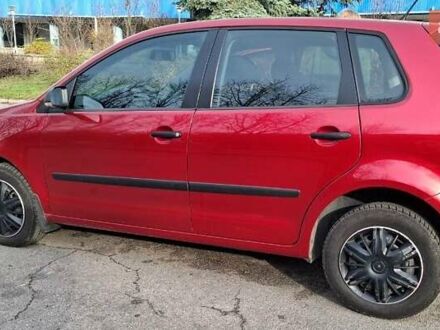 Красный Фольксваген Поло, объемом двигателя 1.4 л и пробегом 99 тыс. км за 6599 $, фото 1 на Automoto.ua