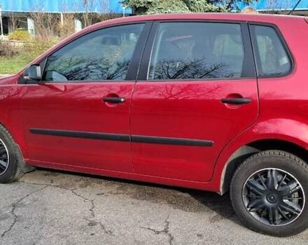 Красный Фольксваген Поло, объемом двигателя 1.4 л и пробегом 99 тыс. км за 6599 $, фото 1 на Automoto.ua