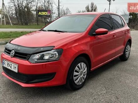 Красный Фольксваген Поло, объемом двигателя 1.39 л и пробегом 158 тыс. км за 6950 $, фото 1 на Automoto.ua
