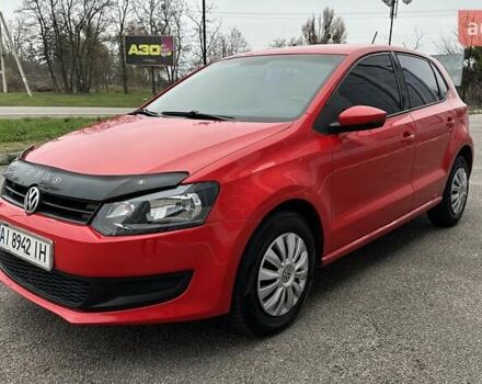 Червоний Фольксваген Поло, об'ємом двигуна 1.39 л та пробігом 158 тис. км за 6950 $, фото 1 на Automoto.ua