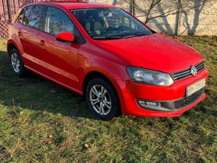 Красный Фольксваген Поло, объемом двигателя 1.4 л и пробегом 167 тыс. км за 6700 $, фото 1 на Automoto.ua