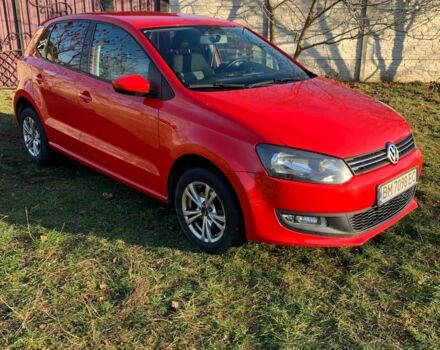 Красный Фольксваген Поло, объемом двигателя 1.4 л и пробегом 167 тыс. км за 6700 $, фото 1 на Automoto.ua