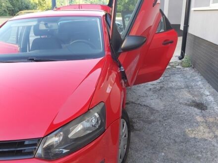 Красный Фольксваген Поло, объемом двигателя 1.2 л и пробегом 150 тыс. км за 5200 $, фото 1 на Automoto.ua