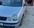 Серый Фольксваген Поло, объемом двигателя 1.4 л и пробегом 320 тыс. км за 1999 $, фото 1 на Automoto.ua