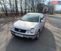Серый Фольксваген Поло, объемом двигателя 1.4 л и пробегом 305 тыс. км за 3300 $, фото 1 на Automoto.ua