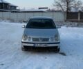 Серый Фольксваген Поло, объемом двигателя 1.4 л и пробегом 320 тыс. км за 1999 $, фото 1 на Automoto.ua