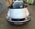 Серый Фольксваген Поло, объемом двигателя 1.4 л и пробегом 210 тыс. км за 3650 $, фото 1 на Automoto.ua