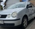Серый Фольксваген Поло, объемом двигателя 1.39 л и пробегом 331 тыс. км за 3800 $, фото 1 на Automoto.ua
