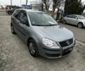 Серый Фольксваген Поло, объемом двигателя 1.4 л и пробегом 180 тыс. км за 5800 $, фото 1 на Automoto.ua