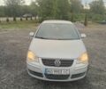 Сірий Фольксваген Поло, об'ємом двигуна 1.2 л та пробігом 295 тис. км за 4013 $, фото 1 на Automoto.ua