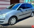 Серый Фольксваген Поло, объемом двигателя 1.4 л и пробегом 206 тыс. км за 5700 $, фото 1 на Automoto.ua