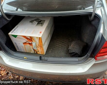 Сірий Фольксваген Поло, об'ємом двигуна 1.4 л та пробігом 68 тис. км за 12000 $, фото 11 на Automoto.ua