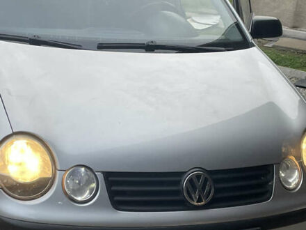 Серый Фольксваген Поло, объемом двигателя 1.4 л и пробегом 255 тыс. км за 3000 $, фото 1 на Automoto.ua