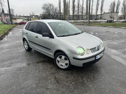 Серый Фольксваген Поло, объемом двигателя 1.4 л и пробегом 301 тыс. км за 3950 $, фото 1 на Automoto.ua