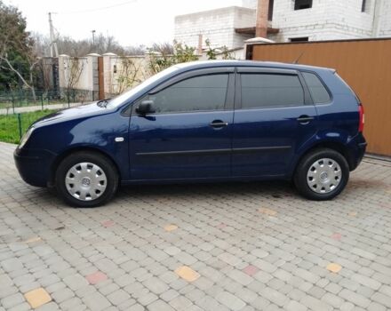 Синий Фольксваген Поло, объемом двигателя 1.4 л и пробегом 250 тыс. км за 3300 $, фото 2 на Automoto.ua