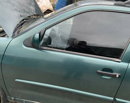 Зелений Фольксваген Поло, об'ємом двигуна 1.39 л та пробігом 234 тис. км за 1350 $, фото 5 на Automoto.ua