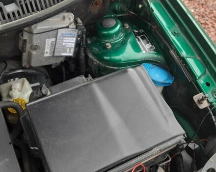 Зеленый Фольксваген Поло, объемом двигателя 1.4 л и пробегом 201 тыс. км за 4250 $, фото 10 на Automoto.ua