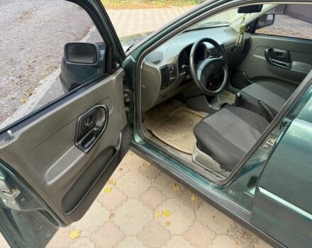 Зеленый Фольксваген Поло, объемом двигателя 1.4 л и пробегом 555 тыс. км за 1375 $, фото 9 на Automoto.ua