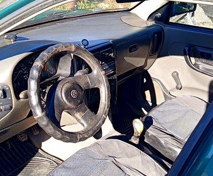 Зеленый Фольксваген Поло, объемом двигателя 1.4 л и пробегом 209 тыс. км за 1000 $, фото 1 на Automoto.ua