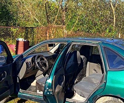 Зеленый Фольксваген Поло, объемом двигателя 1.4 л и пробегом 209 тыс. км за 1000 $, фото 3 на Automoto.ua