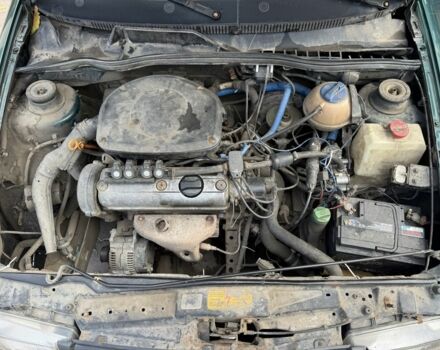 Зеленый Фольксваген Поло, объемом двигателя 1.4 л и пробегом 555 тыс. км за 1375 $, фото 8 на Automoto.ua