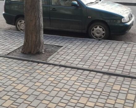 Зеленый Фольксваген Поло, объемом двигателя 1.4 л и пробегом 210 тыс. км за 1500 $, фото 2 на Automoto.ua