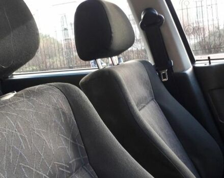 Зеленый Фольксваген Поло, объемом двигателя 1.4 л и пробегом 210 тыс. км за 1500 $, фото 4 на Automoto.ua