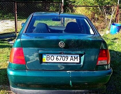 Зеленый Фольксваген Поло, объемом двигателя 1.4 л и пробегом 209 тыс. км за 1000 $, фото 1 на Automoto.ua