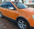 Помаранчевий Фольксваген Поло, об'ємом двигуна 1.39 л та пробігом 196 тис. км за 6700 $, фото 2 на Automoto.ua