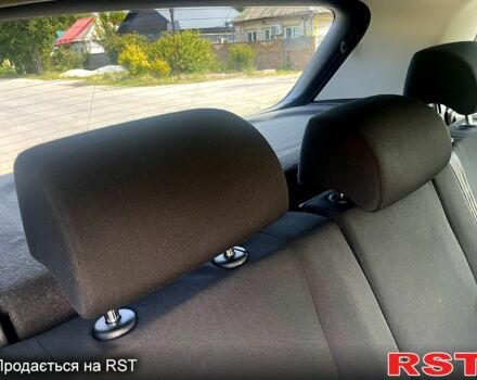 Белый Фольксваген Тигуан, объемом двигателя 2 л и пробегом 113 тыс. км за 9500 $, фото 1 на Automoto.ua