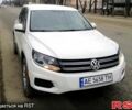 Белый Фольксваген Тигуан, объемом двигателя 2 л и пробегом 165 тыс. км за 12000 $, фото 1 на Automoto.ua
